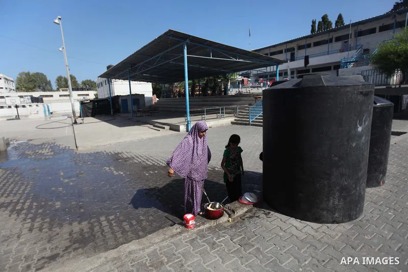 Displaced Palestinians shelter at a United Nations-run school, in Gaza city, on Sept. 13, 2014. Some 34 school buildings in Gaza are damaged beyond repair and 31 more are still being used as shelters, while Gaza prepare...