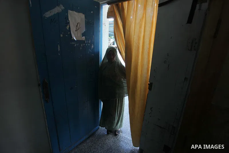Displaced Palestinians shelter at a United Nations-run school, in Gaza city, on Sept. 13, 2014. Some 34 school buildings in Gaza are damaged beyond repair and 31 more are still being used as shelters, while Gaza prepare...