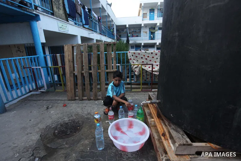 Displaced Palestinians shelter at a United Nations-run school, in Gaza city, on Sept. 13, 2014. Some 34 school buildings in Gaza are damaged beyond repair and 31 more are still being used as shelters, while Gaza prepare...