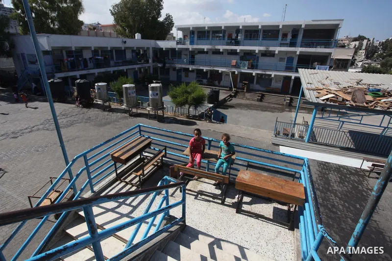 Displaced Palestinians shelter at a United Nations-run school, in Gaza city, on Sept. 13, 2014. Some 34 school buildings in Gaza are damaged beyond repair and 31 more are still being used as shelters, while Gaza prepare...