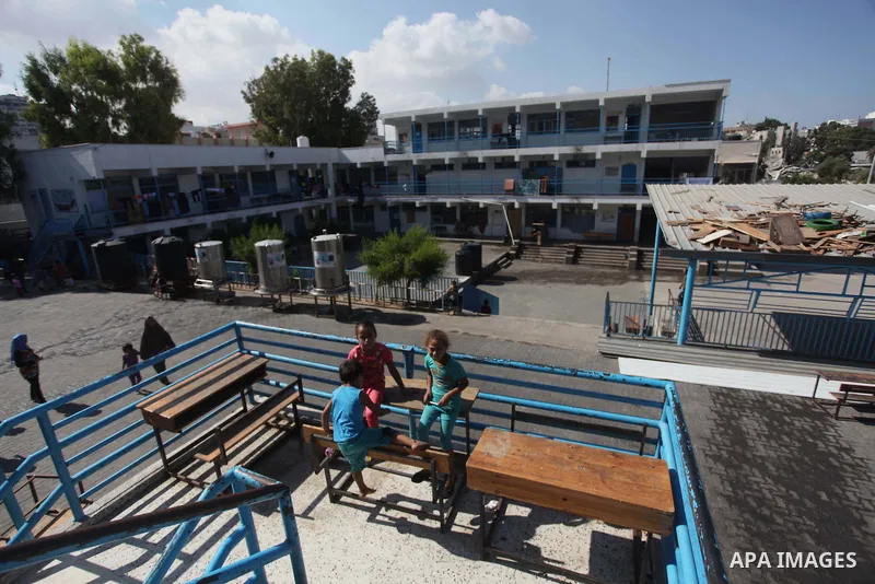 Displaced Palestinians shelter at a United Nations-run school, in Gaza city, on Sept. 13, 2014. Some 34 school buildings in Gaza are damaged beyond repair and 31 more are still being used as shelters, while Gaza prepare...