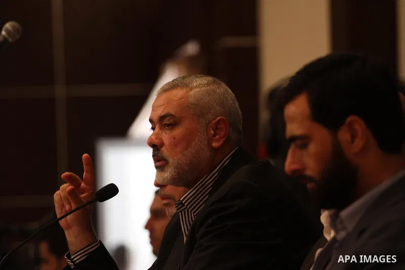 Senior leader of Hamas Ismail Haniyeh speaks during a meeting with members of media in Gaza city on Sept. 13, 2014. Photo by Mohammed Asad