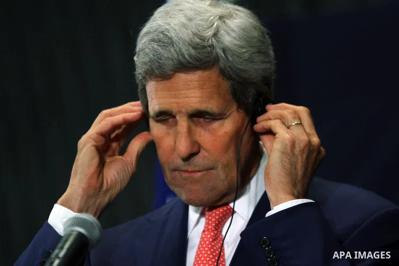 U.S. Secretary of State John Kerry listens to a question during a joint news conference with Egypt's Foreign Minister Sameh Shoukry in Cairo September 13, 2014. Kerry said on Saturday that Egypt has a critical role to pl...