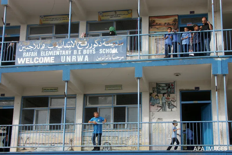 Palestinian students stand inside their a United Nations-run school, on the first day of the new school year in Rafah refugee camp in the southern Gaza Strip September 14, 2014. An open-ended ceasefire between Israel and...