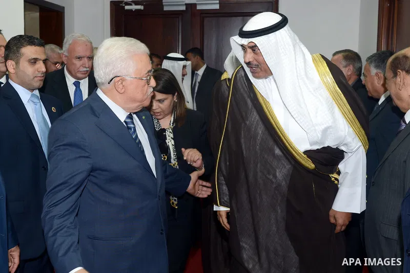 Palestinian President Mahmoud Abbas (L) meets Kuwait's Minister of Foreign Affairs Sheikh Sabah al Khalid al Sabah, in the West Bank city of Ramallah September 14, 2014. Photo by Thaer Ganaim