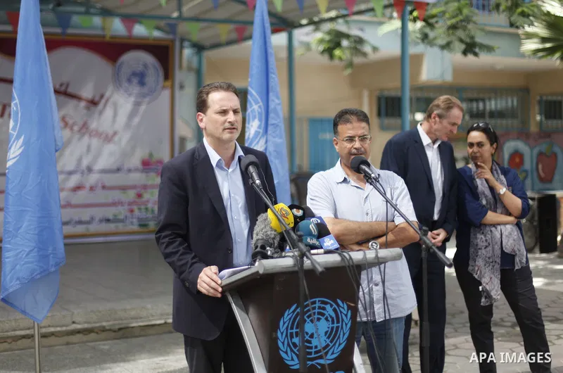 Pierre Krahenbuhl, United Nations Relief and Works Agency (UNRWA) Commissioner-General, speaks to media as he visits a United Nations-run school on the first day of a new school year in Khan Younis in the southern Gaza S...