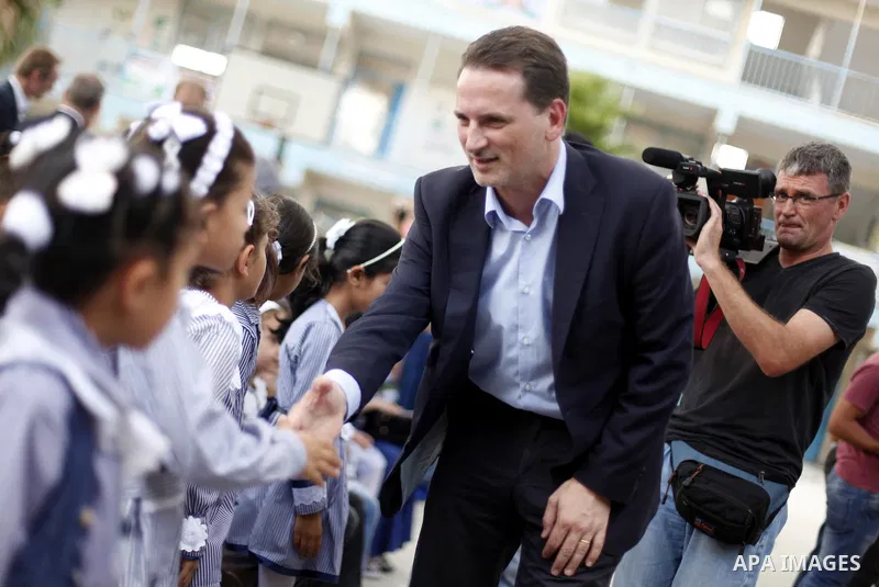 Pierre Krahenbuhl, United Nations Relief and Works Agency (UNRWA) Commissioner-General, visits a United Nations-run school on the first day of a new school year in Khan Younis in the southern Gaza Strip September 14, 201...