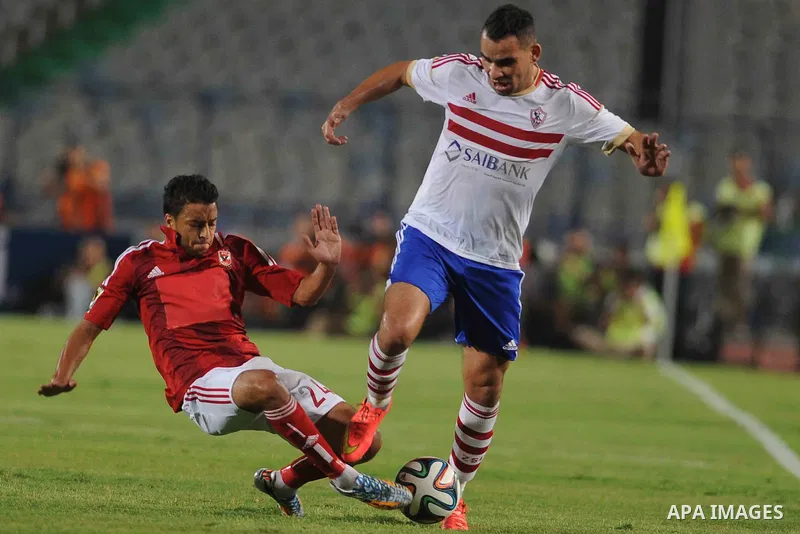 Al Ahly players compete against with Zamalek players during Egyptian Super Cup football match at the Cairo International Stadium, in Cairo, Egypt, Sunday Sept. 14, 2014. The Egyptian football association (EFA) said that...