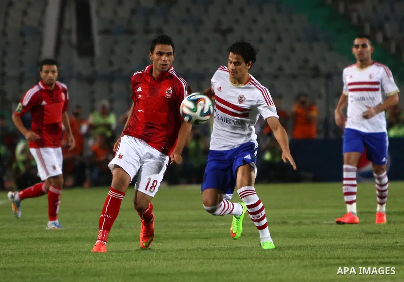 Al Ahly players compete against with Zamalek players during Egyptian Super Cup football match at the Cairo International Stadium, in Cairo, Egypt, Sunday Sept. 14, 2014. The Egyptian football association (EFA) said that...