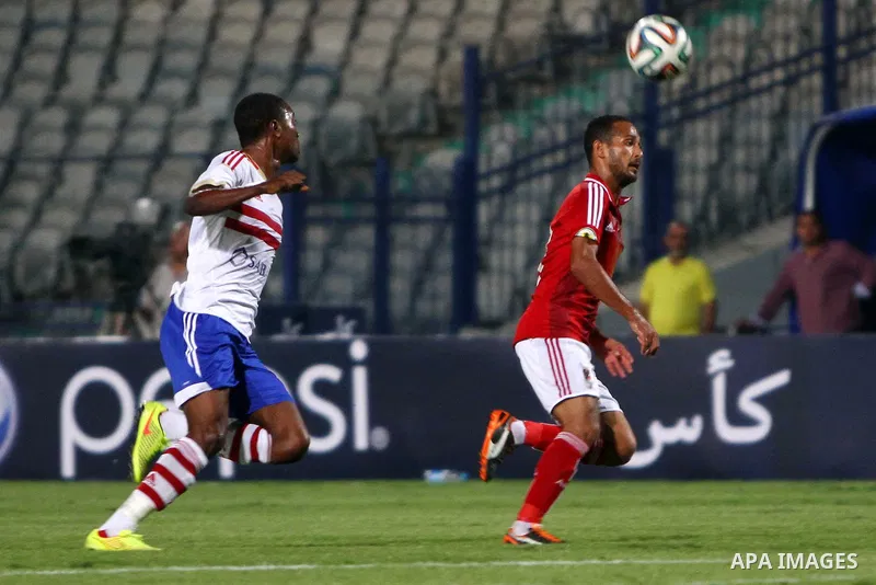 Al Ahly players compete against with Zamalek players during Egyptian Super Cup football match at the Cairo International Stadium, in Cairo, Egypt, Sunday Sept. 14, 2014. The Egyptian football association (EFA) said that...
