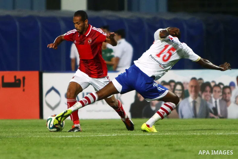 Al Ahly players compete against with Zamalek players during Egyptian Super Cup football match at the Cairo International Stadium, in Cairo, Egypt, Sunday Sept. 14, 2014. The Egyptian football association (EFA) said that...