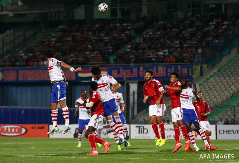 Al Ahly players compete against with Zamalek players during Egyptian Super Cup football match at the Cairo International Stadium, in Cairo, Egypt, Sunday Sept. 14, 2014. The Egyptian football association (EFA) said that...