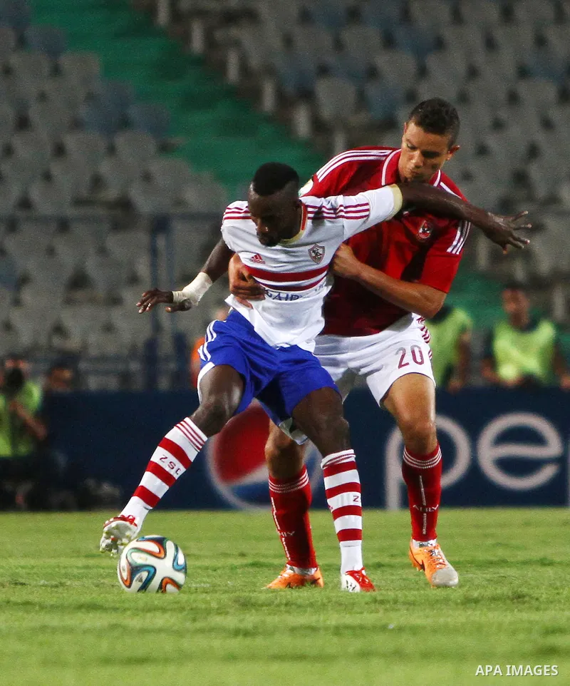 Al Ahly players compete against with Zamalek players during Egyptian Super Cup football match at the Cairo International Stadium, in Cairo, Egypt, Sunday Sept. 14, 2014. The Egyptian football association (EFA) said that...