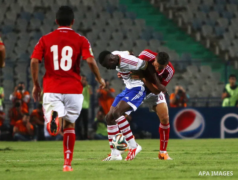 Al Ahly players compete against with Zamalek players during Egyptian Super Cup football match at the Cairo International Stadium, in Cairo, Egypt, Sunday Sept. 14, 2014. The Egyptian football association (EFA) said that...