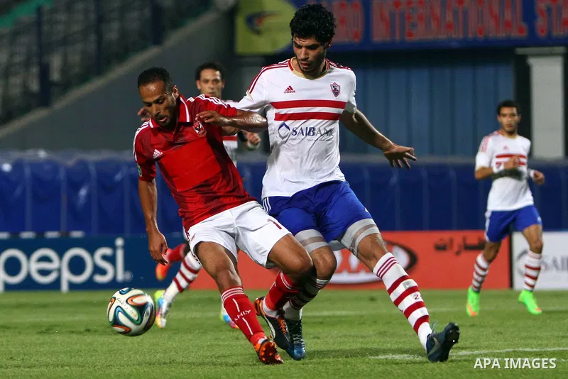 Al Ahly players compete against with Zamalek players during Egyptian Super Cup football match at the Cairo International Stadium, in Cairo, Egypt, Sunday Sept. 14, 2014. The Egyptian football association (EFA) said that...