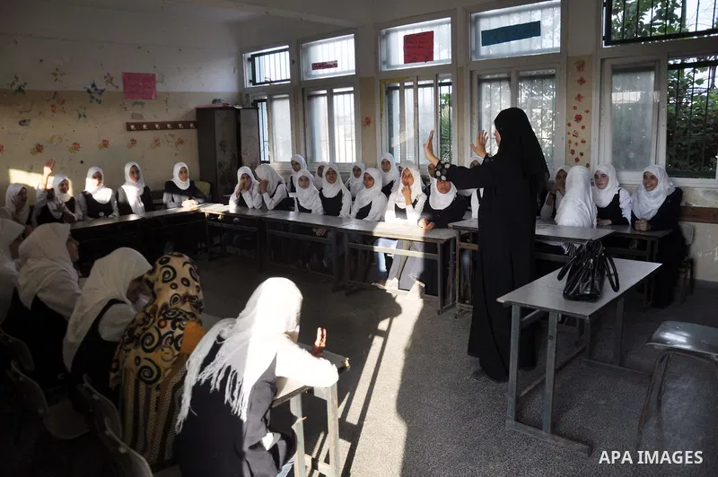 Palestinian students study inside their classroom on the second day of the school year in al-Sheiaeiya neighborhood in the east of Gaza City, on Sept 15, 2014. School year started in the Gaza Strip on Sunday after a thre...