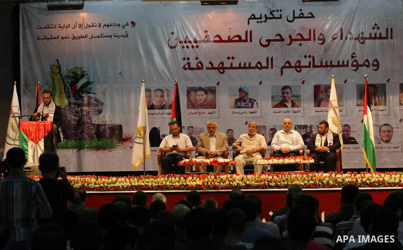 Senior Hamas leader Mahmoud Al-Zahar attends a ceremony to honor the relatives of the media members who were killed in the Israeli offensive in Gaza city on September 18, 2014. An open-ended ceasefire between Israel and...