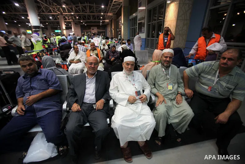 Palestinian Muslim pilgrims arrive at the King Abdulaziz international airport as they prepare to go for their pilgrimage to Mecca, on Sept. 23, 2014. Hundreds of Palestinian pilgrims are leaving Gaza strip through the R...