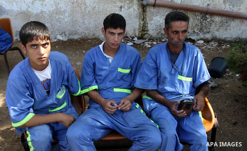 Palestinian Cleaners take part during a protest to demand their salaries, in Gaza City September 23, 2014. An open-ended ceasefire between Israel and Hamas-led Gaza militants, mediated by Egypt, took effect on August 26...