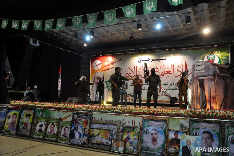 Palestinians attend a ceremony to honor the relatives of the students who were killed in the Israeli offensive on Sep. 25, 2014. An open-ended ceasefire between Israel and Hamas-led Gaza militants, mediated by Egypt, too...