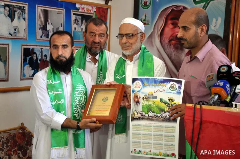 Palestinian Hamas leaders attend a press conference to announce a new public campaign to visit the destroyed houses and the families of Palestinians who were killed by Israel during the summer's fierce offensive, in Gaza...