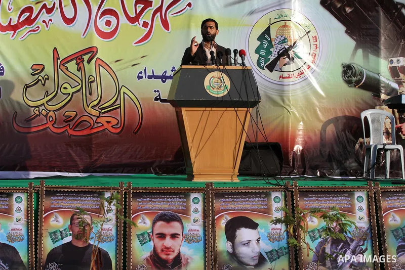 Hamas Member of Parliament, Mushir al-Masri, speaks during a ceremony to honor Palestinians who were killed by Israel during the summer's fierce offensive, in Gaza city on Sep. 26, 2014. Palestinian leader Mahmoud Abbas...