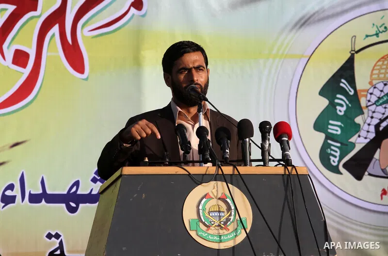 Hamas Member of Parliament, Mushir al-Masri, speaks during a ceremony to honor Palestinians who were killed by Israel during the summer's fierce offensive, in Gaza city on Sep. 26, 2014. Palestinian leader Mahmoud Abbas...