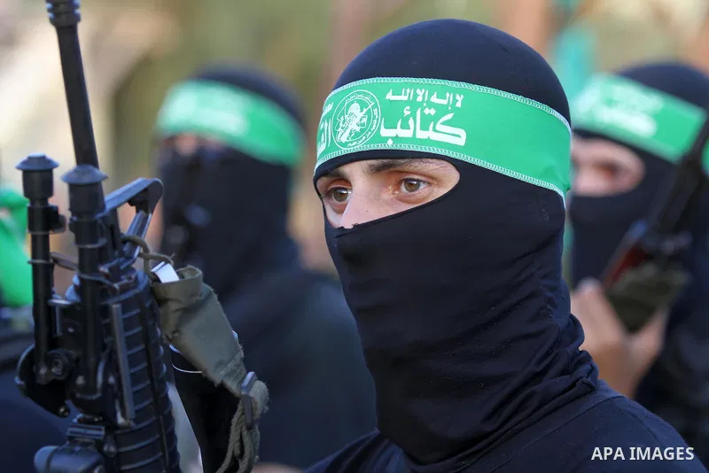 Members of Ezzedin al-Qassam brigades take part in a ceremony to honor Palestinians who were killed by Israel during the summer's fierce offensive, in Gaza city on Sep. 26, 2014. Palestinian leader Mahmoud Abbas returned...