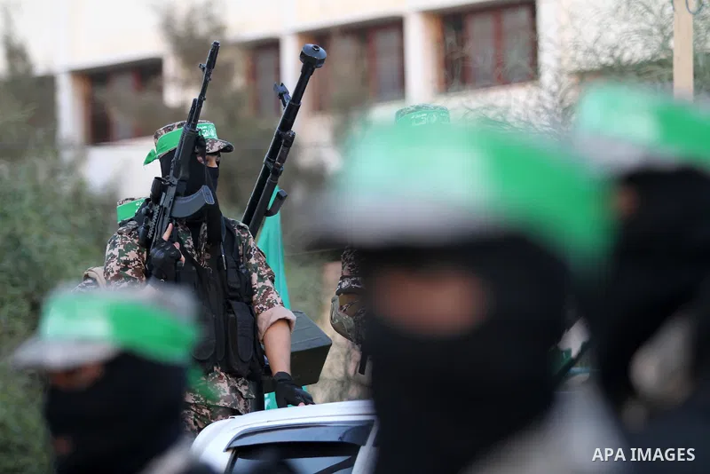 Members of Ezzedin al-Qassam brigades take part in a ceremony to honor Palestinians who were killed by Israel during the summer's fierce offensive, in Gaza city on Sep. 26, 2014. Palestinian leader Mahmoud Abbas returned...