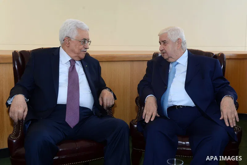 Palestinian President Mahmoud Abbas meets with Syrian Foreign minister Walid al-Moallem on the sidelines of the United Nations General Assembly meeting on September 26, 2014 in New York City. Abbas returned to the United...