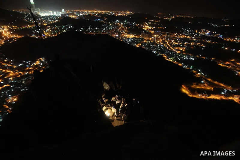 Muslim pilgrims pray at Mount Al-Noor during the annual haj pilgrimage in Mecca, on September 29, 2014, Mount Al-Noor houses Ghar-E-Hira or Hira cave, where Prophet Mohammad is said to have spent a great deal of time in...