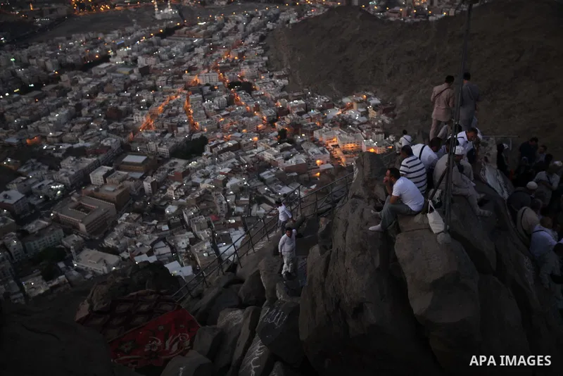 Muslim pilgrims pray at Mount Al-Noor during the annual haj pilgrimage in Mecca, on September 29, 2014, Mount Al-Noor houses Ghar-E-Hira or Hira cave, where Prophet Mohammad is said to have spent a great deal of time in...