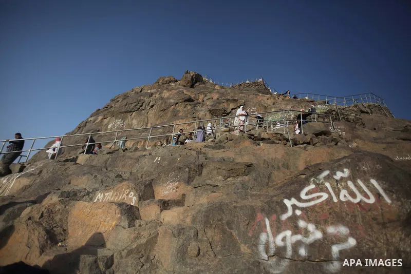Muslim pilgrims pray at Mount Al-Noor during the annual haj pilgrimage in Mecca, on September 28, 2014, Mount Al-Noor houses Ghar-E-Hira or Hira cave, where Prophet Mohammad is said to have spent a great deal of time in...
