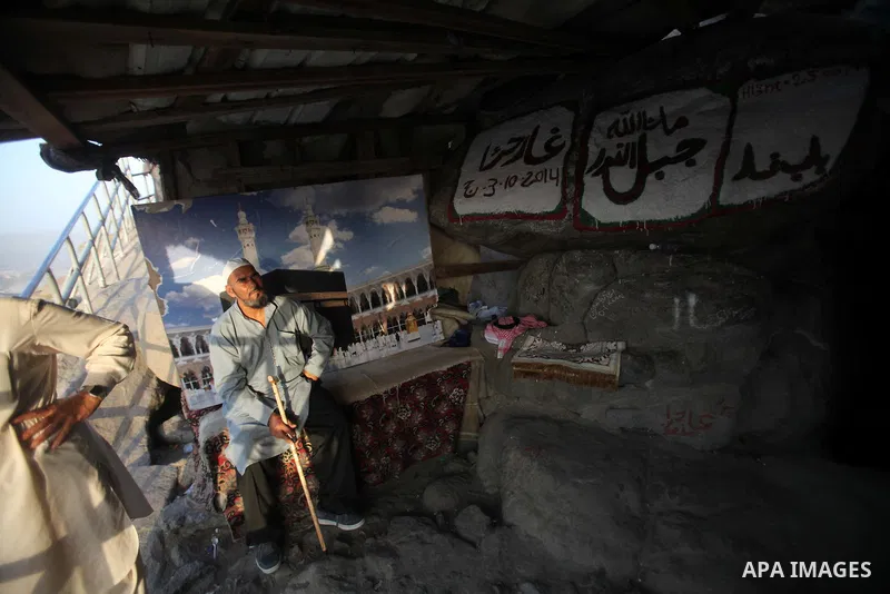 Muslim pilgrims pray at Mount Al-Noor during the annual haj pilgrimage in Mecca, on September 28, 2014, Mount Al-Noor houses Ghar-E-Hira or Hira cave, where Prophet Mohammad is said to have spent a great deal of time in...
