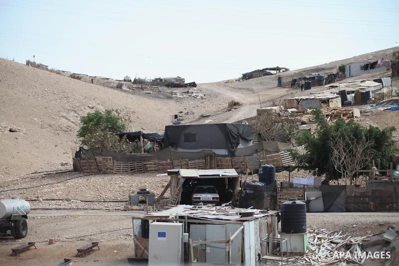 Bedouin dwellings are seen in the West Bank village of Al-Eizariya, near east of Jerusalem, on Septemper 30, 2014. Israel's Civil Administration in the West Bank is advancing a plan to expel thousands of Bedouin from lan...