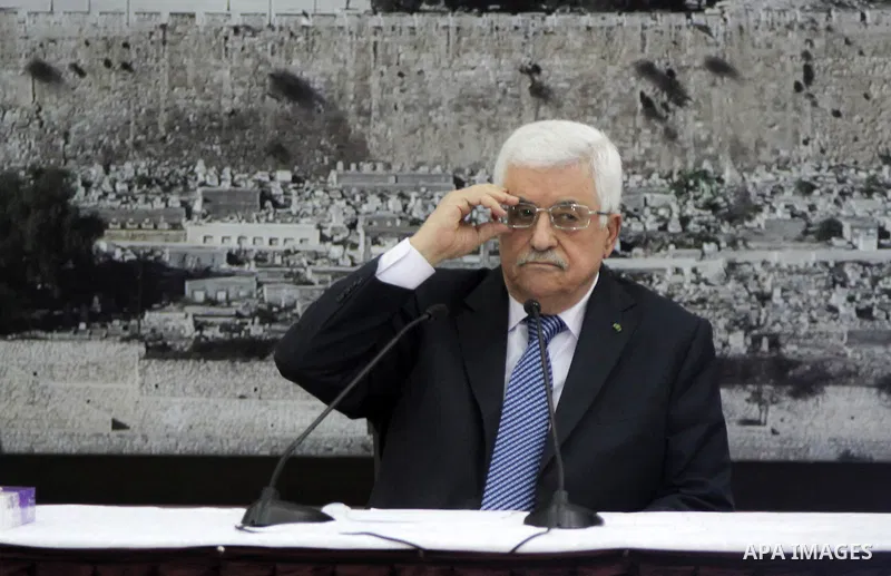 President Mahmoud Abbas meets with Palestinian leadership, at Abbas's headquarter in the West Bank city of Ramallah, on October 1, 2014. Abbas said that he will reevaluate the Palestinian Authority's ties with Israel if...
