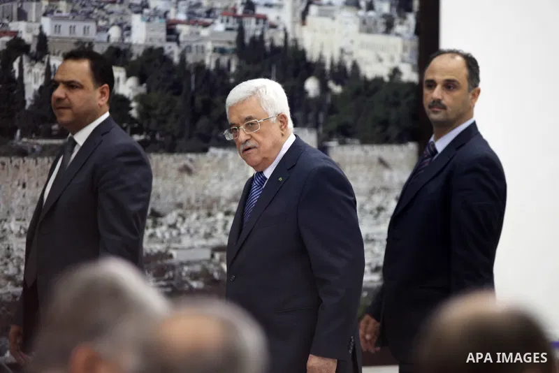 President Mahmoud Abbas meets with Palestinian leadership, at Abbas's headquarter in the West Bank city of Ramallah, on October 1, 2014. Abbas said that he will reevaluate the Palestinian Authority's ties with Israel if...