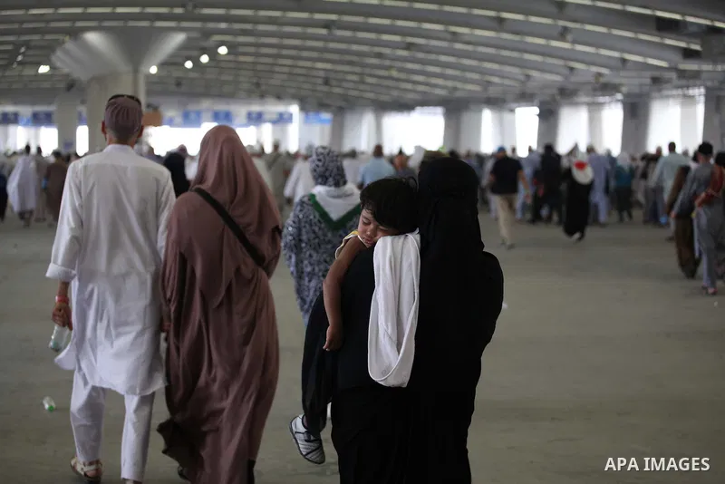 Muslim pilgrims arrive to cast stones at a pillar, symbolizing the stoning of Satan, in a ritual called "Jamarat," a rite of the annual hajj, in Mina near the holy city of Mecca on October 05, 2014. The pilgrims perform...