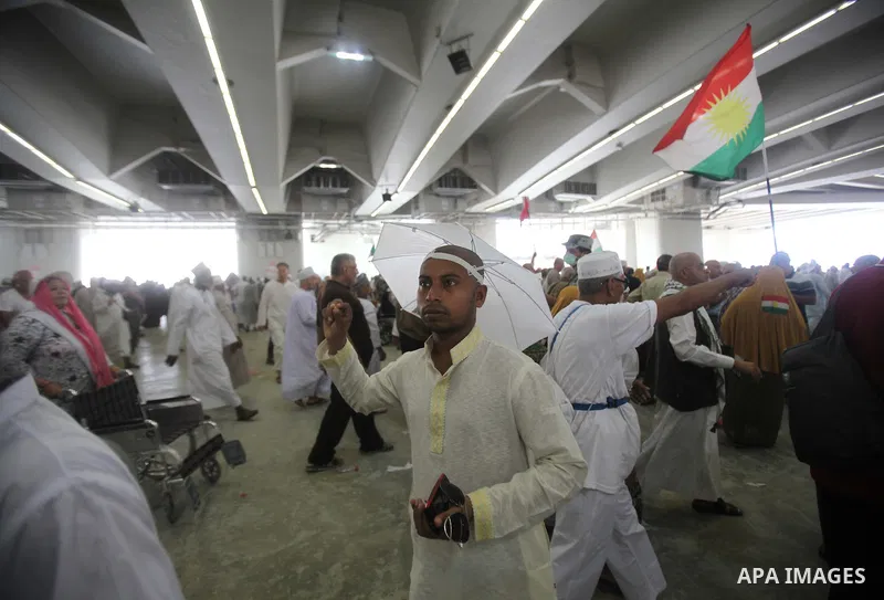 Muslim pilgrims arrive to cast stones at a pillar, symbolizing the stoning of Satan, in a ritual called "Jamarat," a rite of the annual hajj, in Mina near the holy city of Mecca on October 05, 2014. The pilgrims perform...