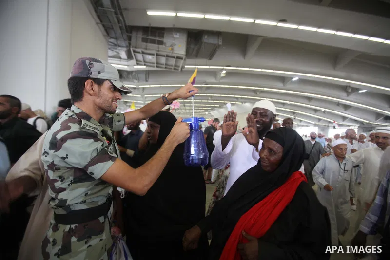 Muslim pilgrims arrive to cast stones at a pillar, symbolizing the stoning of Satan, in a ritual called "Jamarat," a rite of the annual hajj, in Mina near the holy city of Mecca on October 05, 2014. The pilgrims perform...