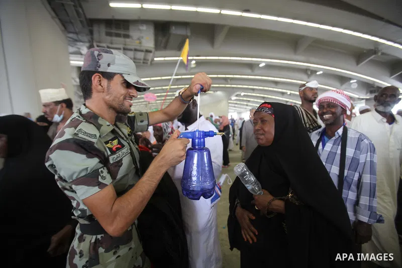 Muslim pilgrims arrive to cast stones at a pillar, symbolizing the stoning of Satan, in a ritual called "Jamarat," a rite of the annual hajj, in Mina near the holy city of Mecca on October 05, 2014. The pilgrims perform...