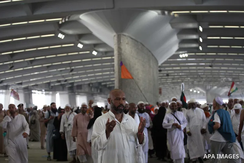 Muslim pilgrims arrive to cast stones at a pillar, symbolizing the stoning of Satan, in a ritual called "Jamarat," a rite of the annual hajj, in Mina near the holy city of Mecca on October 05, 2014. The pilgrims perform...