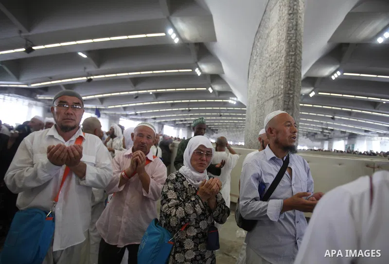 Muslim pilgrims arrive to cast stones at a pillar, symbolizing the stoning of Satan, in a ritual called "Jamarat," a rite of the annual hajj, in Mina near the holy city of Mecca on October 05, 2014. The pilgrims perform...