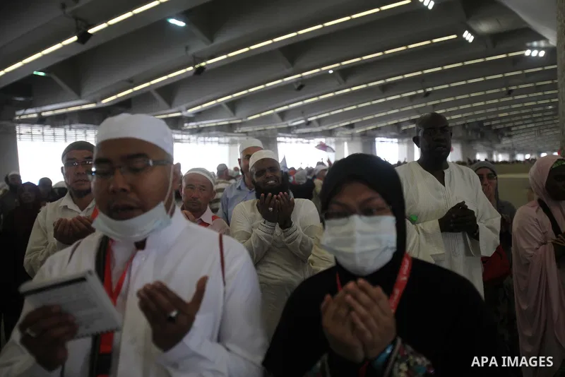 Muslim pilgrims arrive to cast stones at a pillar, symbolizing the stoning of Satan, in a ritual called "Jamarat," a rite of the annual hajj, in Mina near the holy city of Mecca on October 05, 2014. The pilgrims perform...