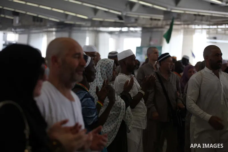 Muslim pilgrims arrive to cast stones at a pillar, symbolizing the stoning of Satan, in a ritual called "Jamarat," a rite of the annual hajj, in Mina near the holy city of Mecca on October 05, 2014. The pilgrims perform...