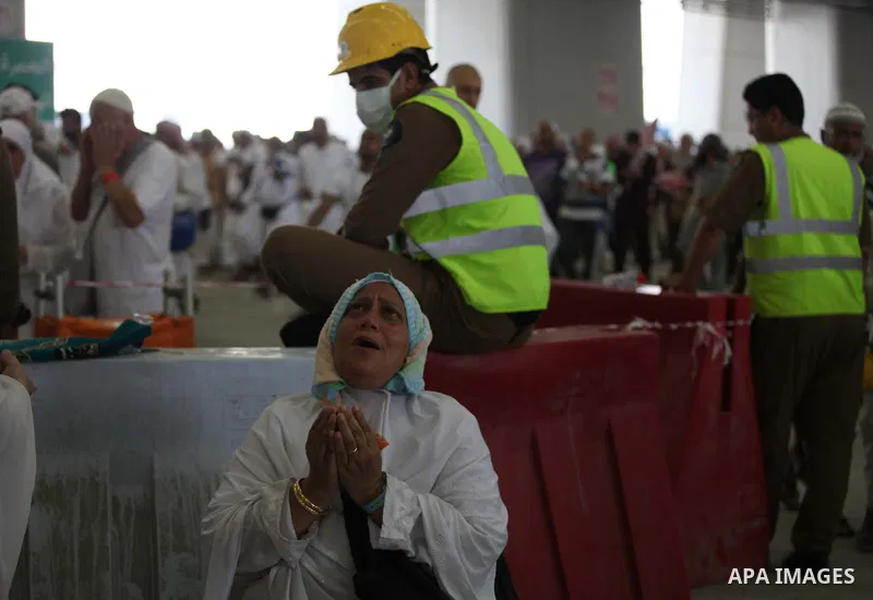 Muslim pilgrims arrive to cast stones at a pillar, symbolizing the stoning of Satan, in a ritual called "Jamarat," a rite of the annual hajj, in Mina near the holy city of Mecca on October 05, 2014. The pilgrims perform...