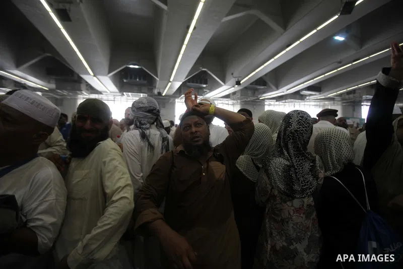 Muslim pilgrims arrive to cast stones at a pillar, symbolizing the stoning of Satan, in a ritual called "Jamarat," a rite of the annual hajj, in Mina near the holy city of Mecca on October 05, 2014. The pilgrims perform...
