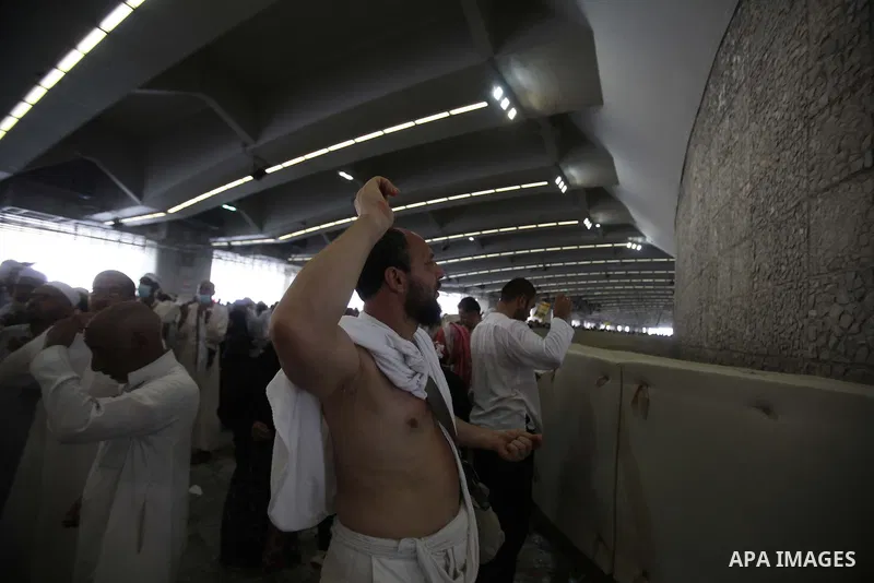 Muslim pilgrims arrive to cast stones at a pillar, symbolizing the stoning of Satan, in a ritual called "Jamarat," a rite of the annual hajj, in Mina near the holy city of Mecca on October 05, 2014. The pilgrims perform...
