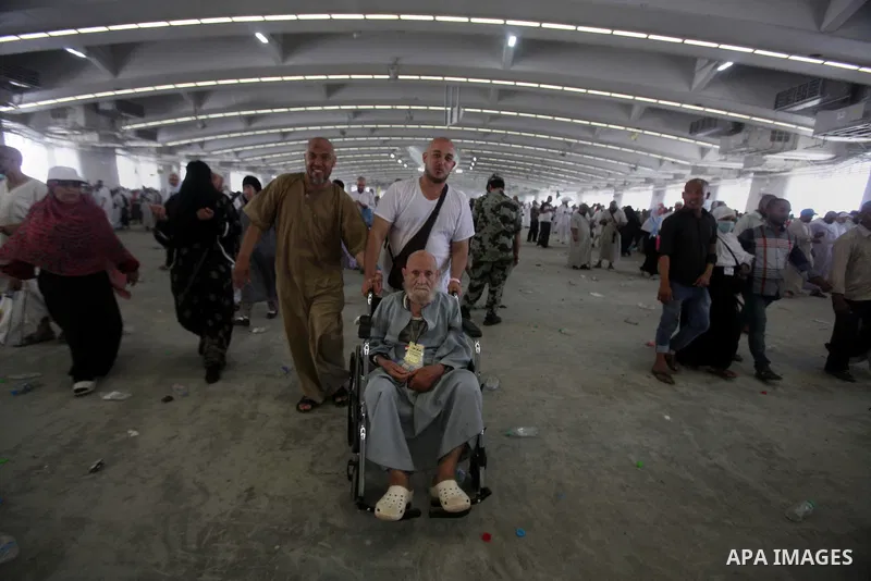 Muslim pilgrims arrive to cast stones at a pillar, symbolizing the stoning of Satan, in a ritual called "Jamarat," a rite of the annual hajj, in Mina near the holy city of Mecca on October 06, 2014. The pilgrims perform...