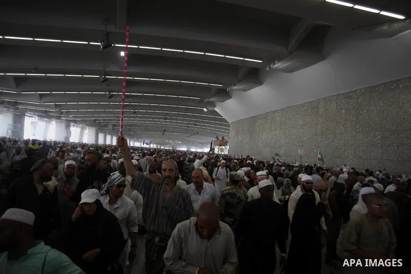 Muslim pilgrims arrive to cast stones at a pillar, symbolizing the stoning of Satan, in a ritual called "Jamarat," a rite of the annual hajj, in Mina near the holy city of Mecca on October 06, 2014. The pilgrims perform...